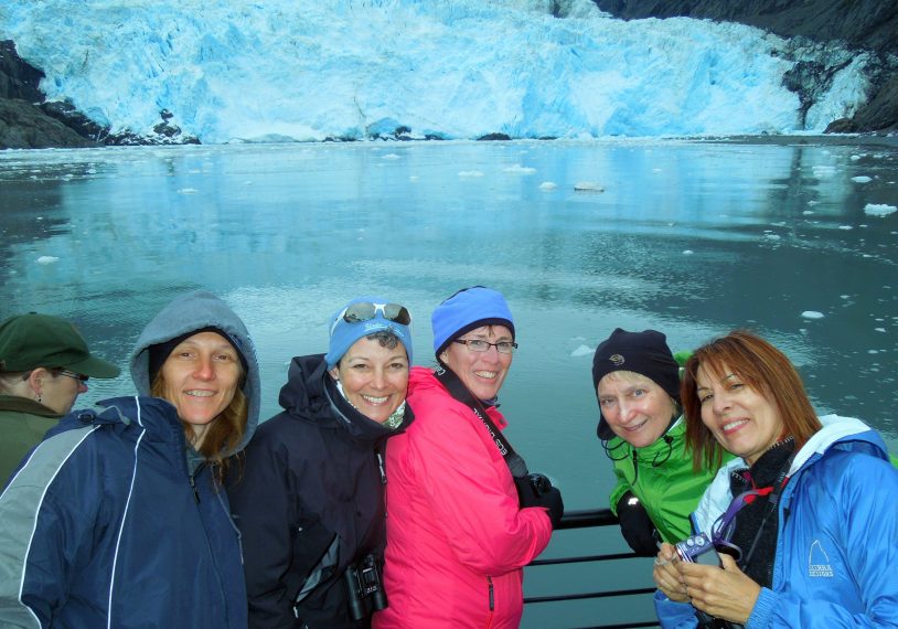 Adventure Women in front of tidewater glacier