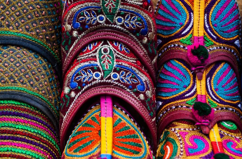 A pile of colorful and Traditional shoes of Rajasthan