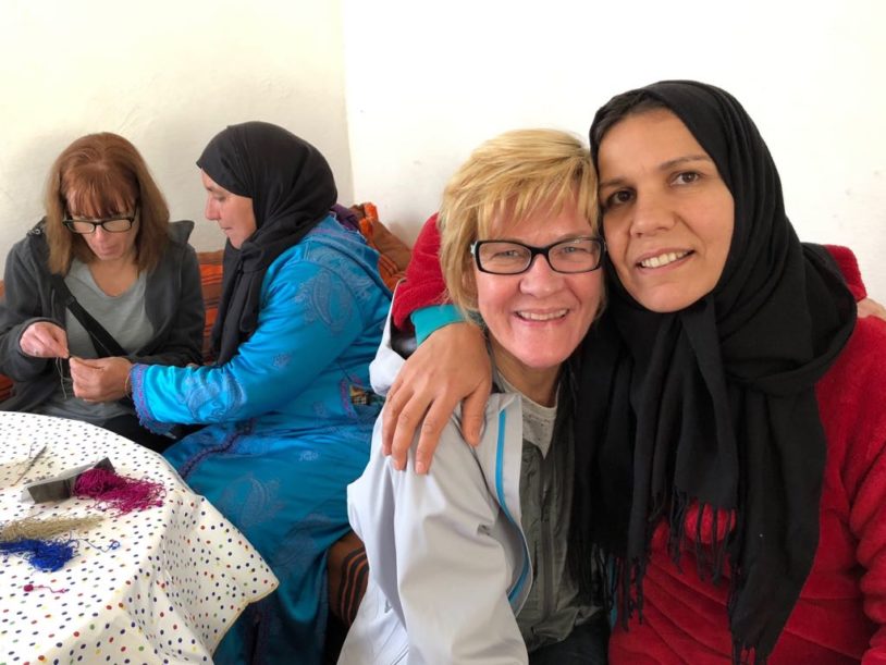AdventureWomen guests meeting a local women's cooperative in Morocco