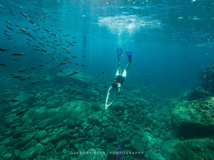 snorkeler in Baja women adventure trips
