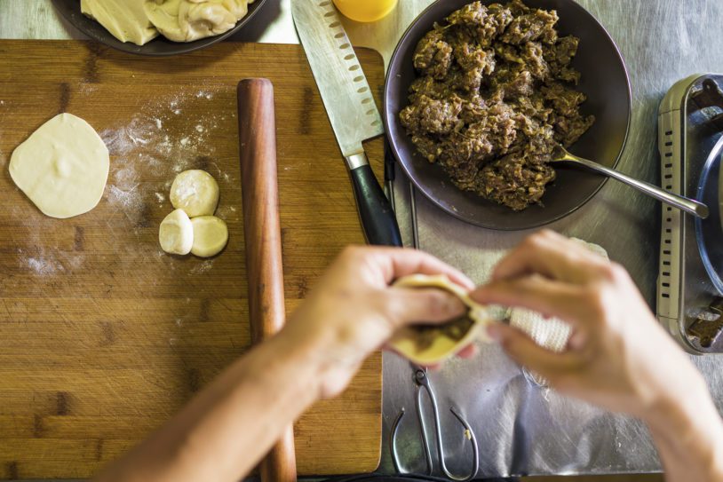 Chef creating steamed dumplings