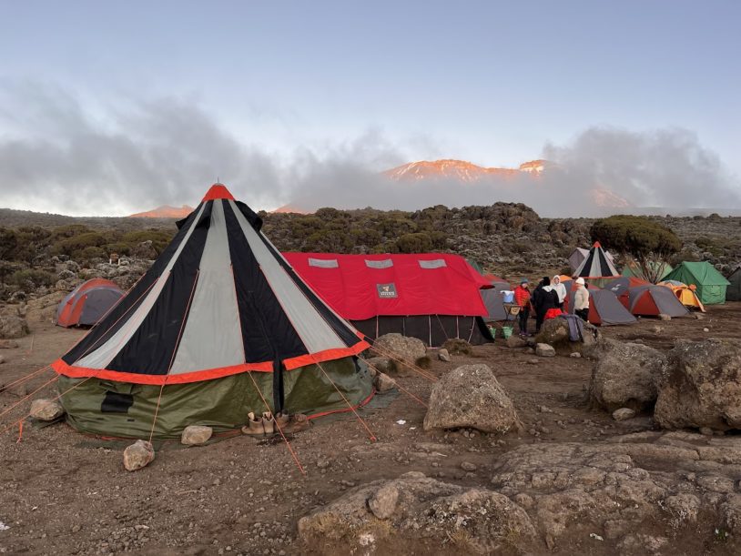 Brightly colored food and sleeping tents on Mt Kilimanjaro with AdventureWomen