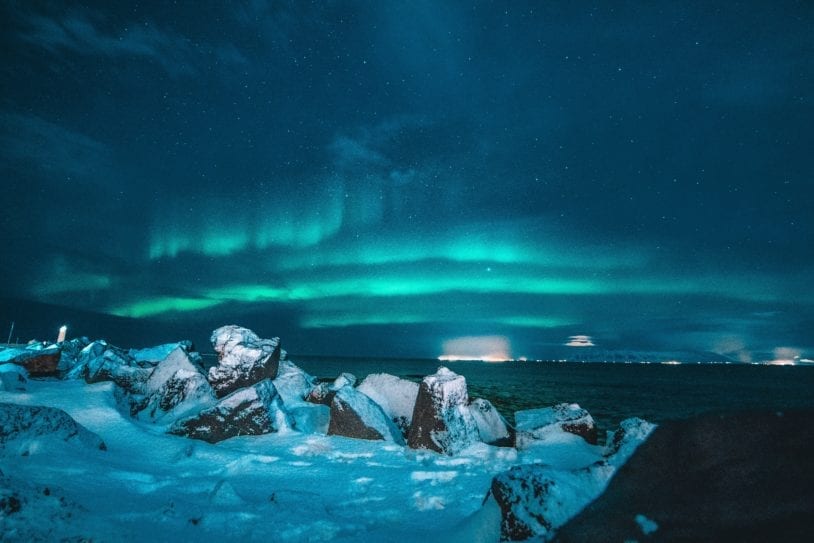 Northern Lights radiating in the winter sky in Iceland