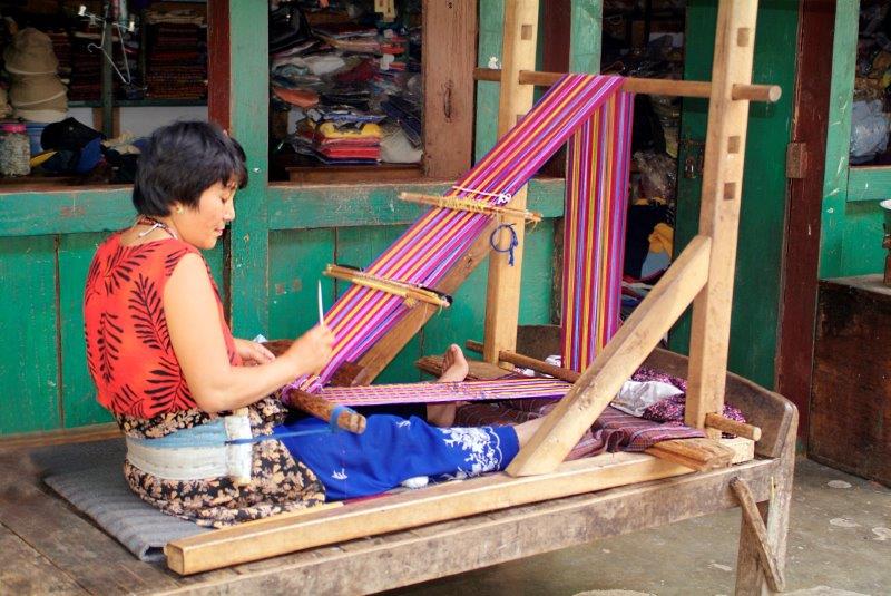A local weaving textiles in Bhutan