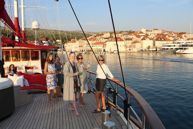 AdventureWomen group posing on ship deck in Croatia