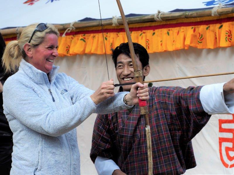 Archery in Bhutan with woman