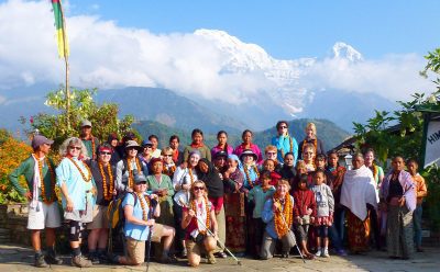 Group photo with guests, porters and villagers