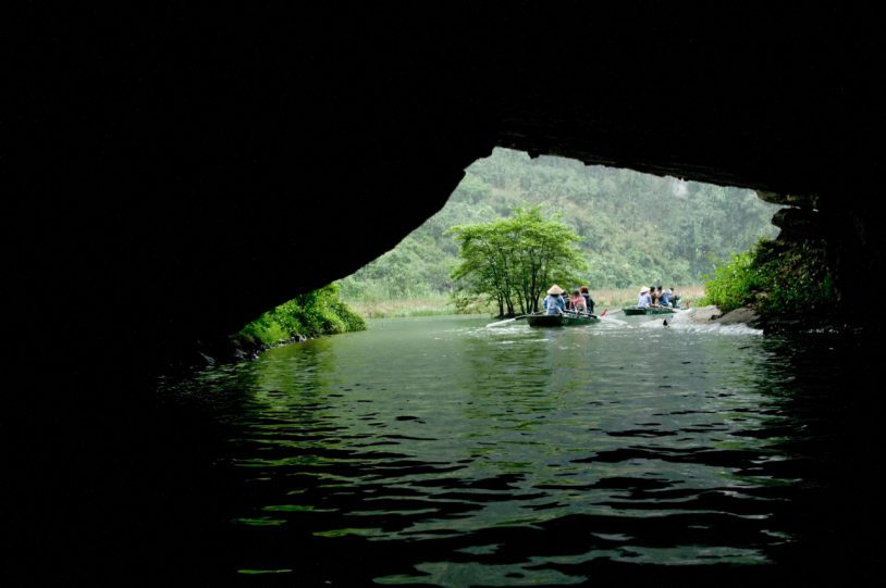 Trang An is a scenic area near Ninh Binh, Vietnam renowned for its boat cave tours.