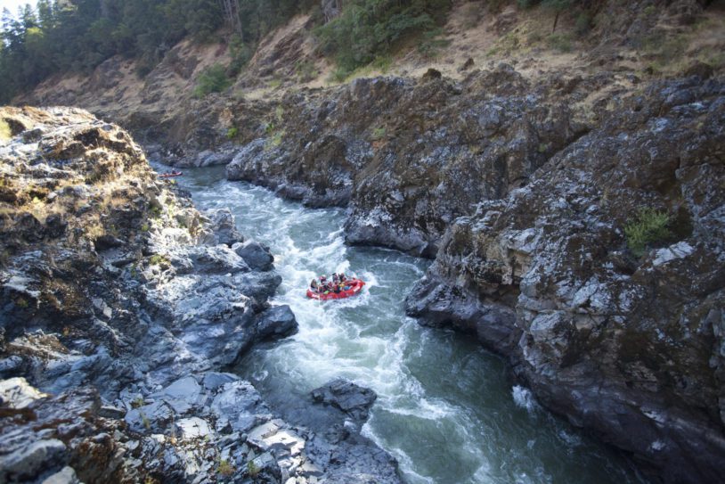 Overhead shot of rafting in a small canyon on the Rogue River
