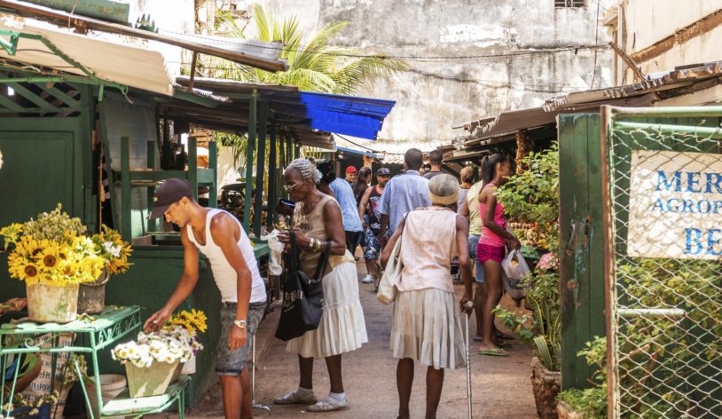 People shopping at a food market in central Havana Cuba.