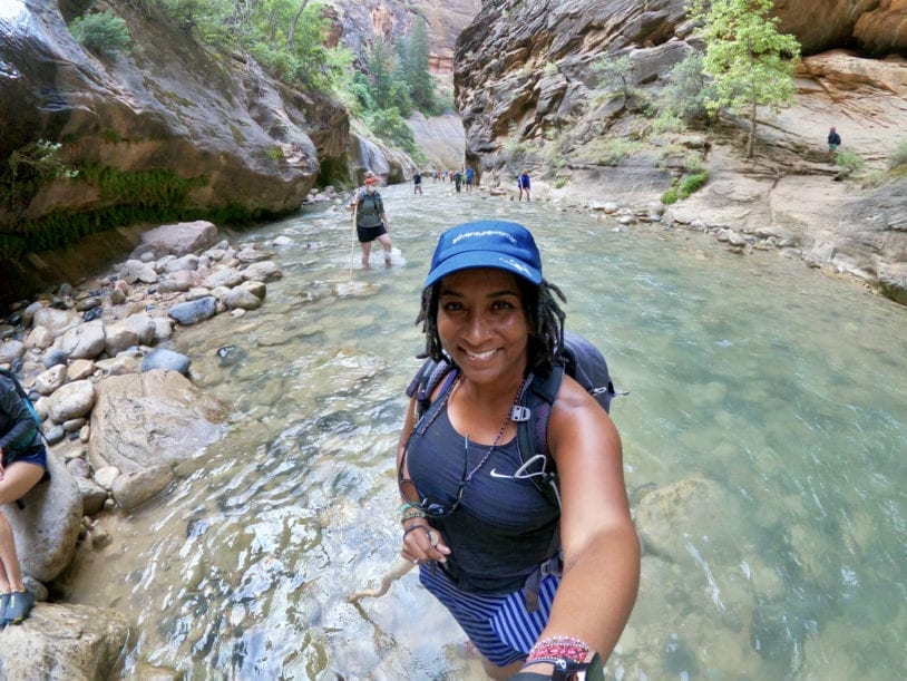 Hiking the Narrows in Zion Nation Park on women's hiking trip