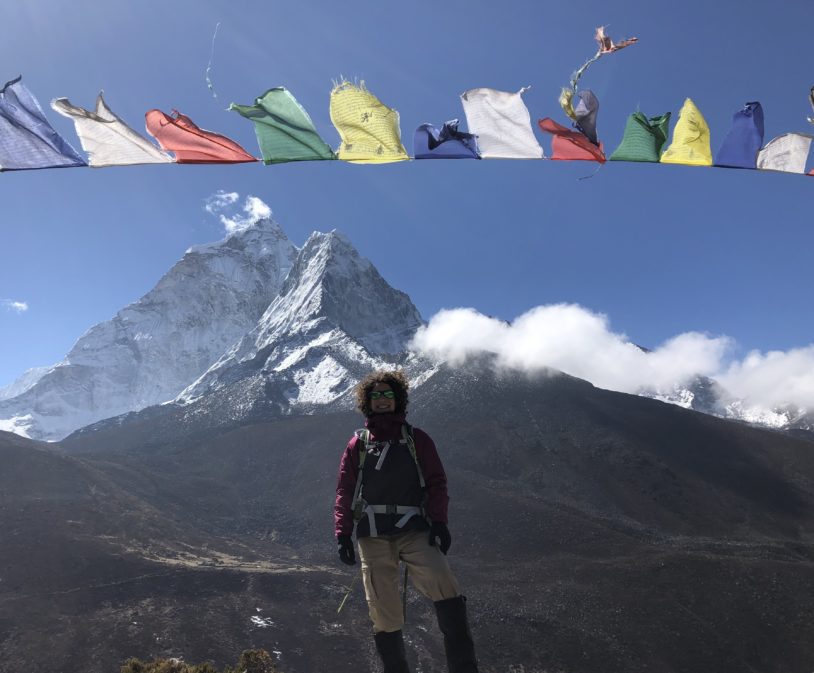 Adventure Woman with view of Ama Dablam in background