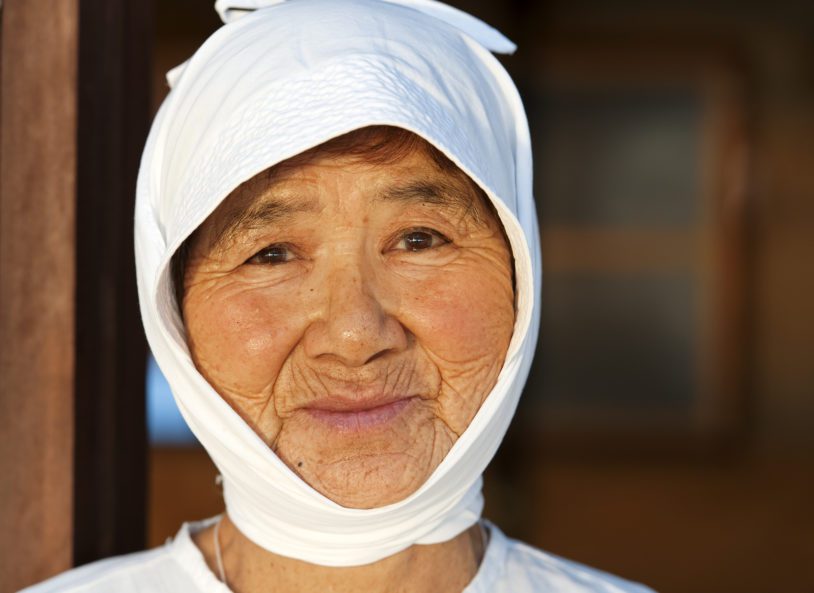 ama diver with traditional white clothing in the ' Hachiman' divers Hut in Toba.Ama are Japanese divers, most of them are women, famous for pearl diving