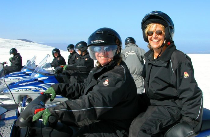 Smiles before riding snowmobile to top of Lanjokull glacier